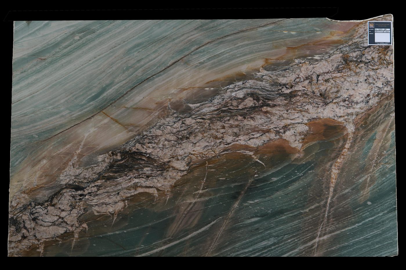 Multicolour granite slab with copper tones