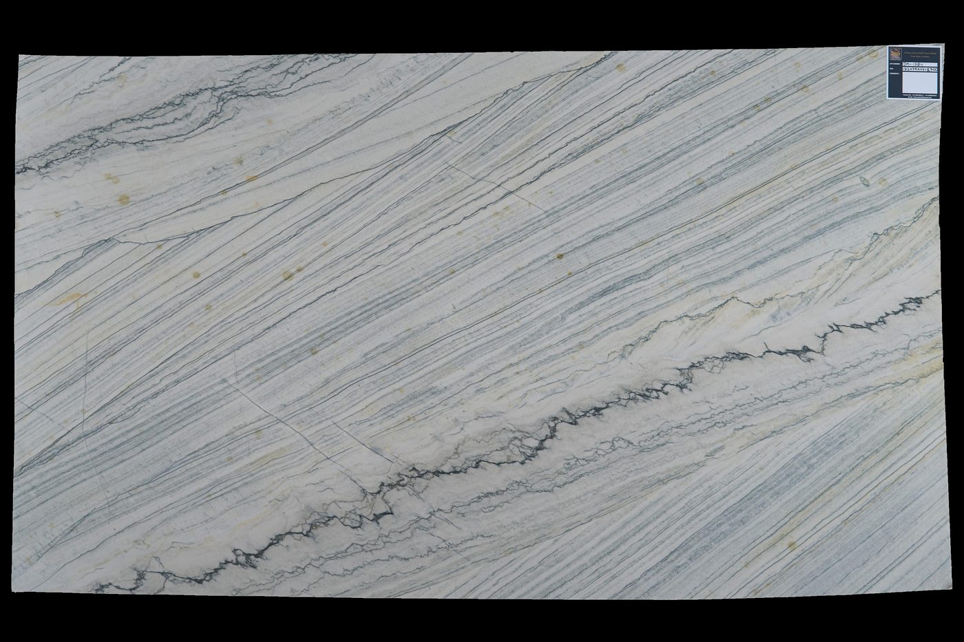 White marble slab with linear grey veining